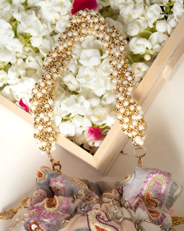 Sitara_Round_Potli_Bag_with_Pastel_Paisley_Embroidery_&_Pearl_Handle